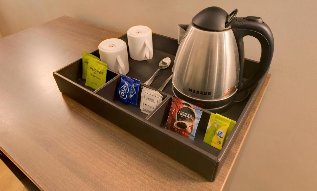 Central Beacon Hotel Сурат Екстериор снимка
